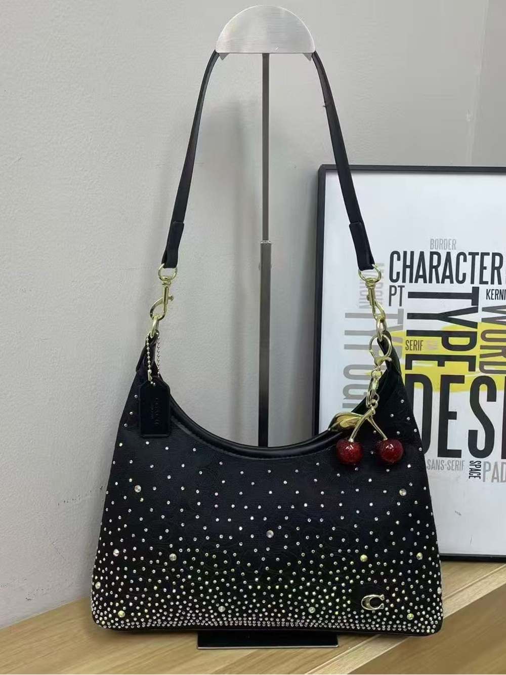 Coach Black Shoulder Bag with Gold Hardware and Red Cherry Charm